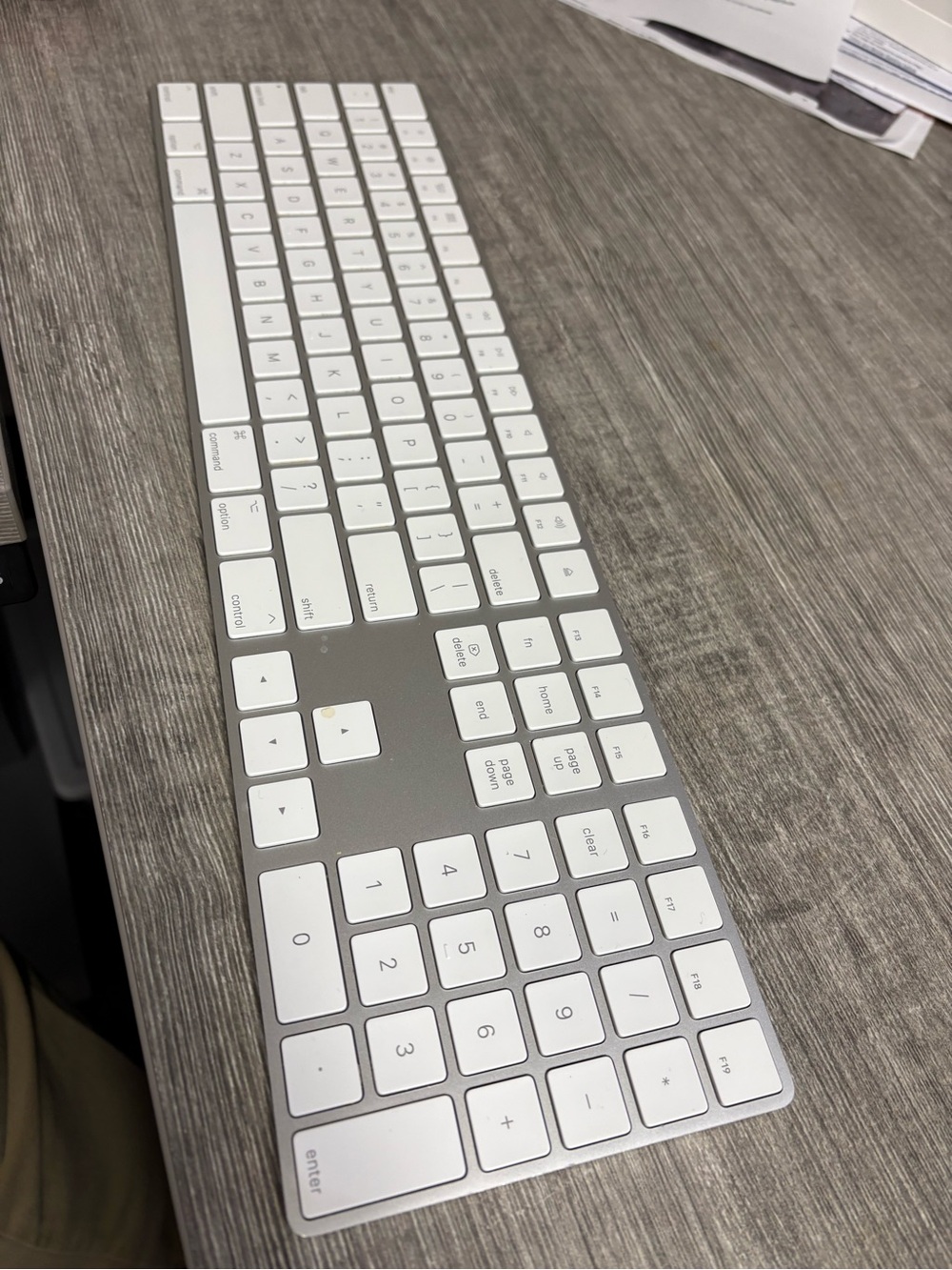 Apple Magic Keyboard in Silver and White lightning cable